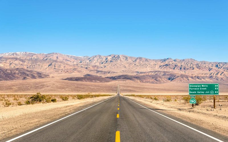 Death Valley in California - Empty infinite Road in the Desert