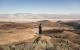 Man on rock looking out over Death Valley National Park, California, USA